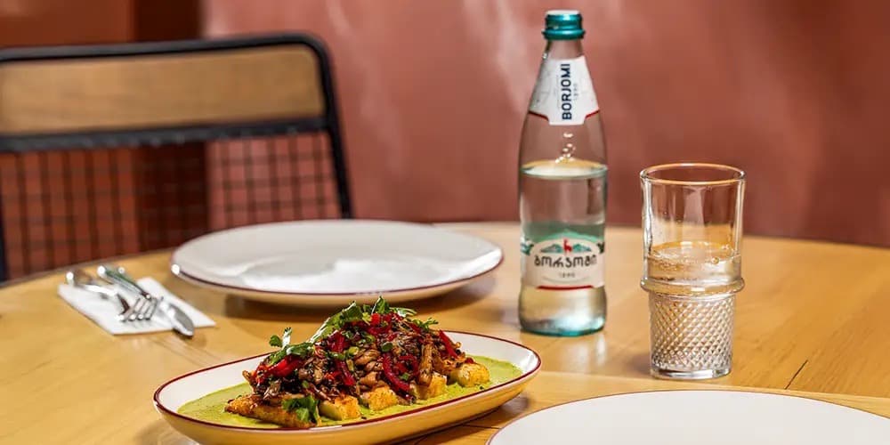 Crispy wood mushrooms with fried ghomi and ajika