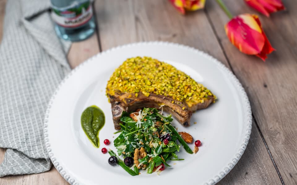 Pork ribs with mint sauce and greens